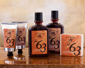 Pre de Provence balm held in hand to show bottle size and travel-friendly convenience