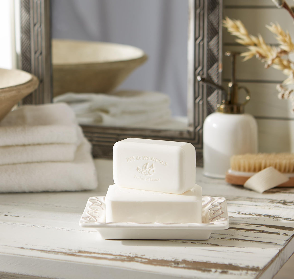 Pre de Provence lathered in hand showing rich creamy foam for gentle moisturizing cleanse