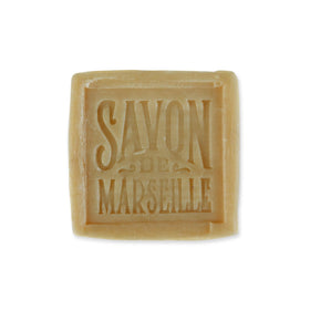 Pre de Provence soap cube held in hand demonstrating 300g size and multi-use convenience