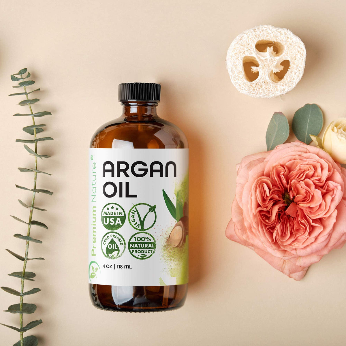 Premium Nature oil poured on hand demonstrating fast-absorbing hydration benefit