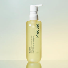 Prequel oil texture close-up demonstrating lightweight, nourishing consistency