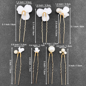 PrettyLife hair pins arranged in a bride updo add floral accents for photos