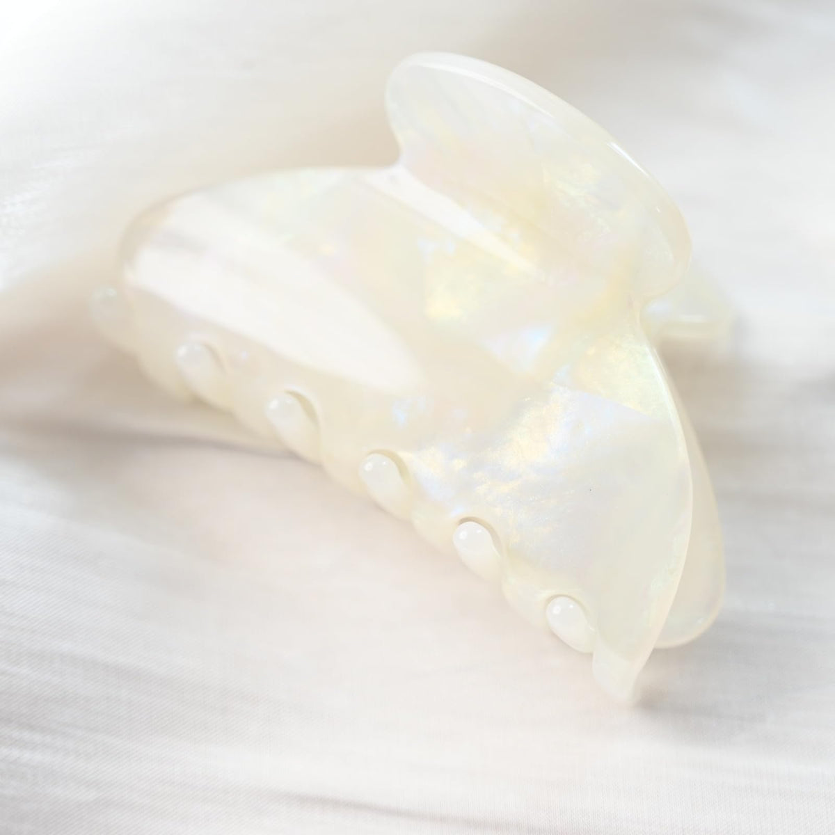 Prettyou jade white close-up of acetate pattern highlighting rich gloss and depth