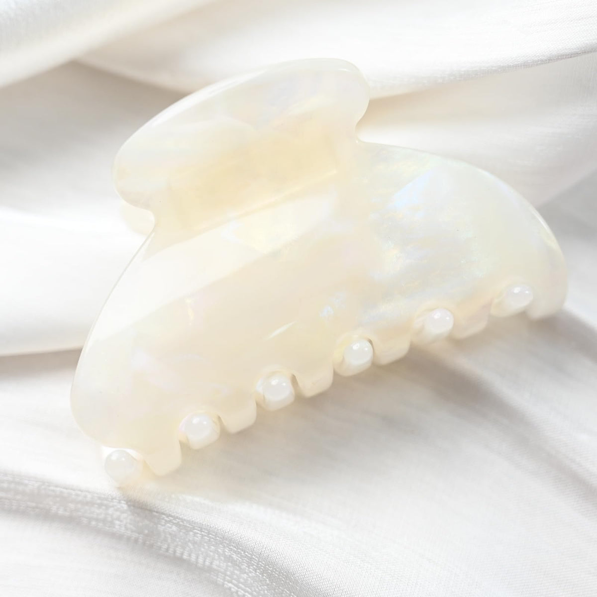 Prettyou jade white lifestyle tabletop shot showing elegant accessory styling