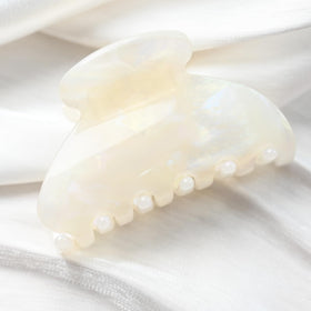 Prettyou jade white lifestyle tabletop shot showing elegant accessory styling