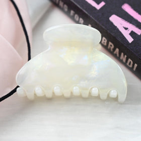 Prettyou jade white size comparison beside ruler showing medium 6.5cm length