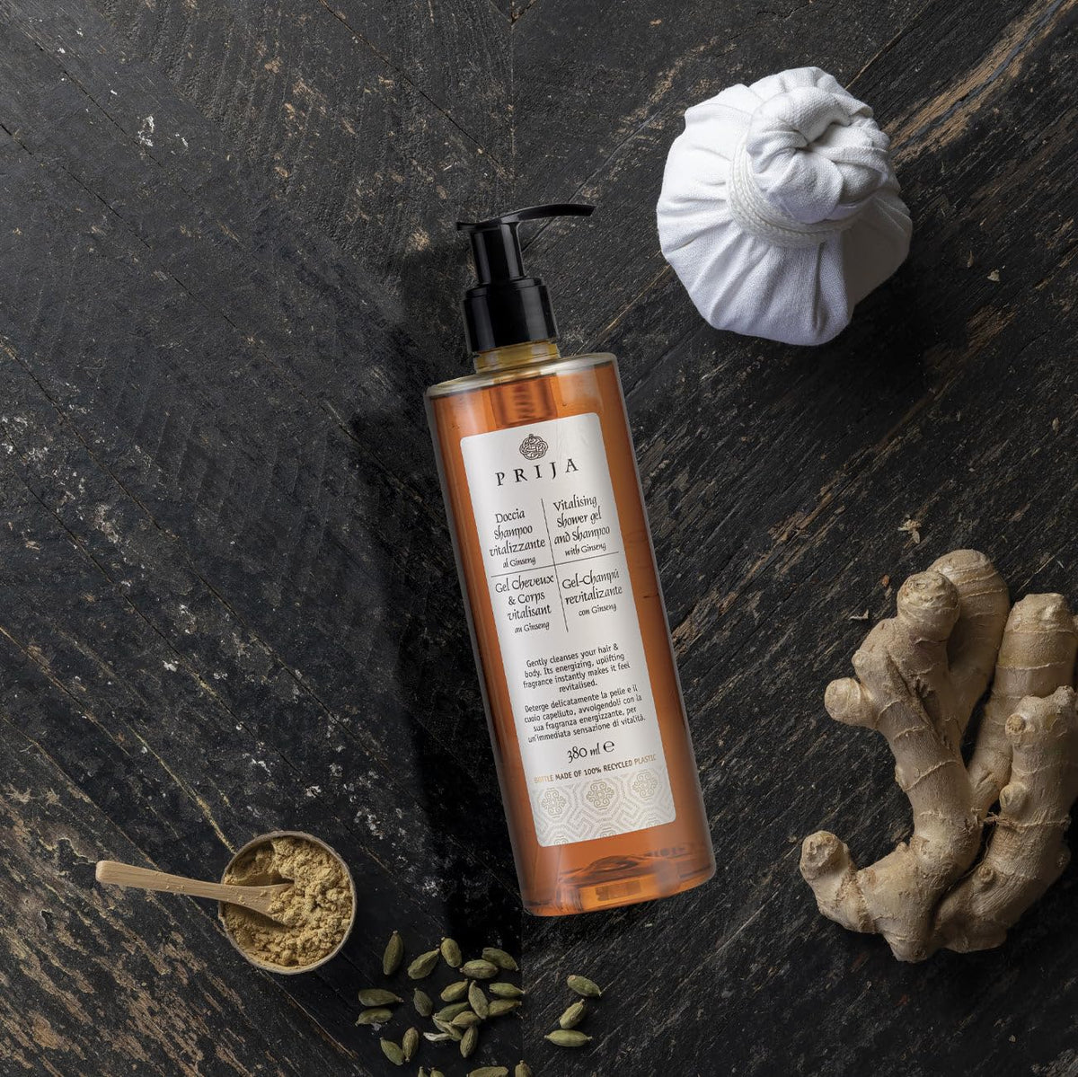 Prija bottle on recycled paper background highlighting eco packaging benefit