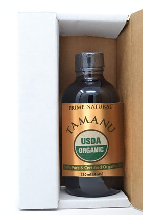 PRIME NATURAL hand applying tamanu oil to cuticles for softer nails and moisturized skin