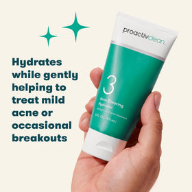 Person applying Proactiv hydrator to cheek demonstrating calming hydration and clearer pores