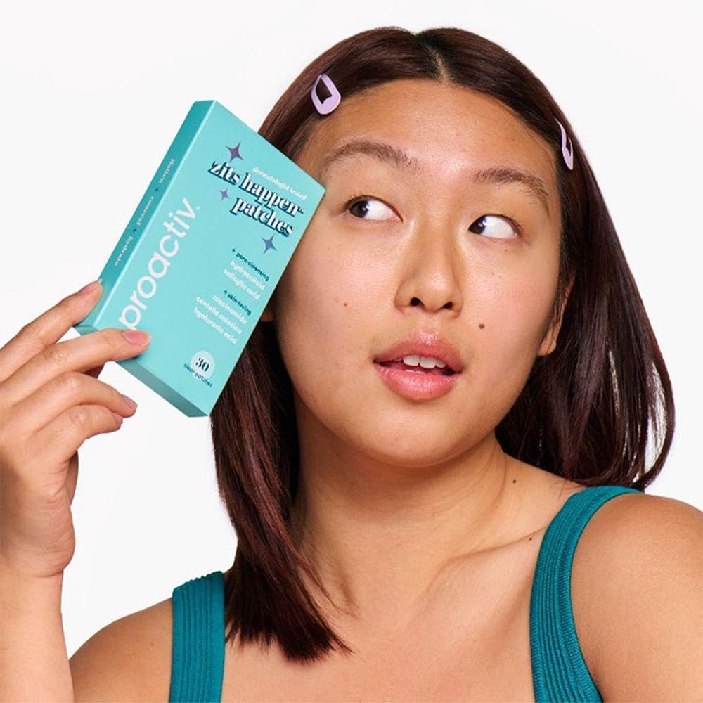 Proactiv patches placed on back blemishes illustrating body use