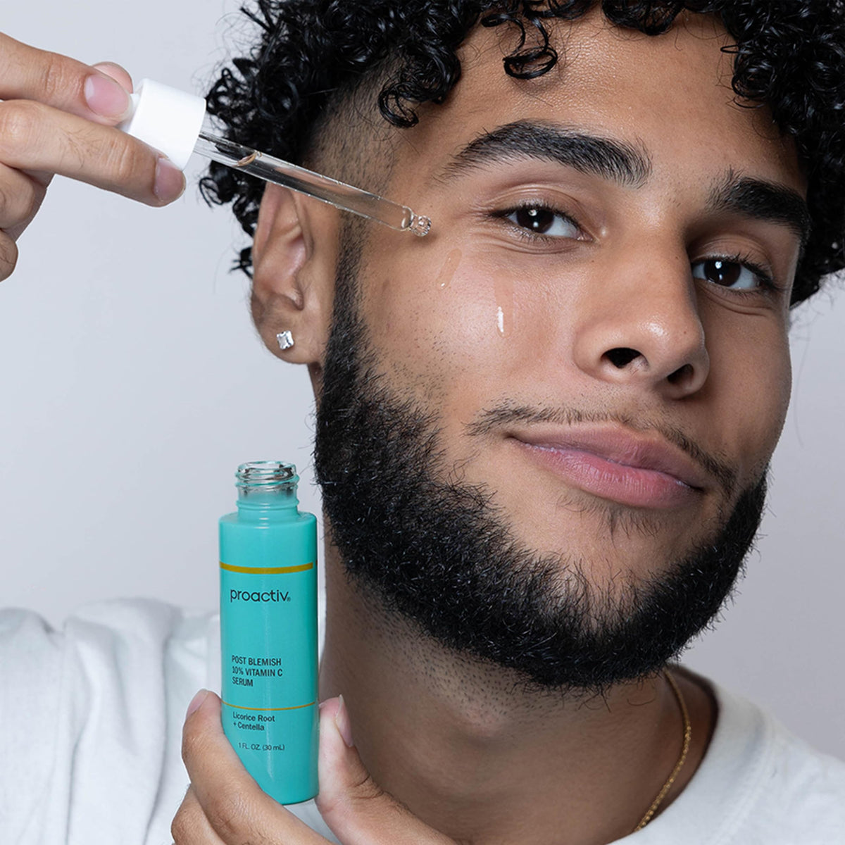 Proactiv bottle in hand showing size and portability benefit for daily use