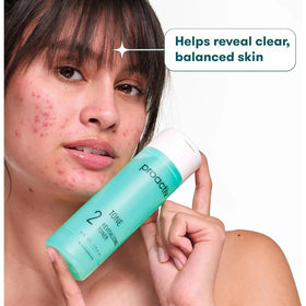 Proactiv toner poured onto cotton pad, demonstrates easy application benefit