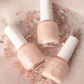 Probelle brush stroking polish on nail for sheer coverage and even finish