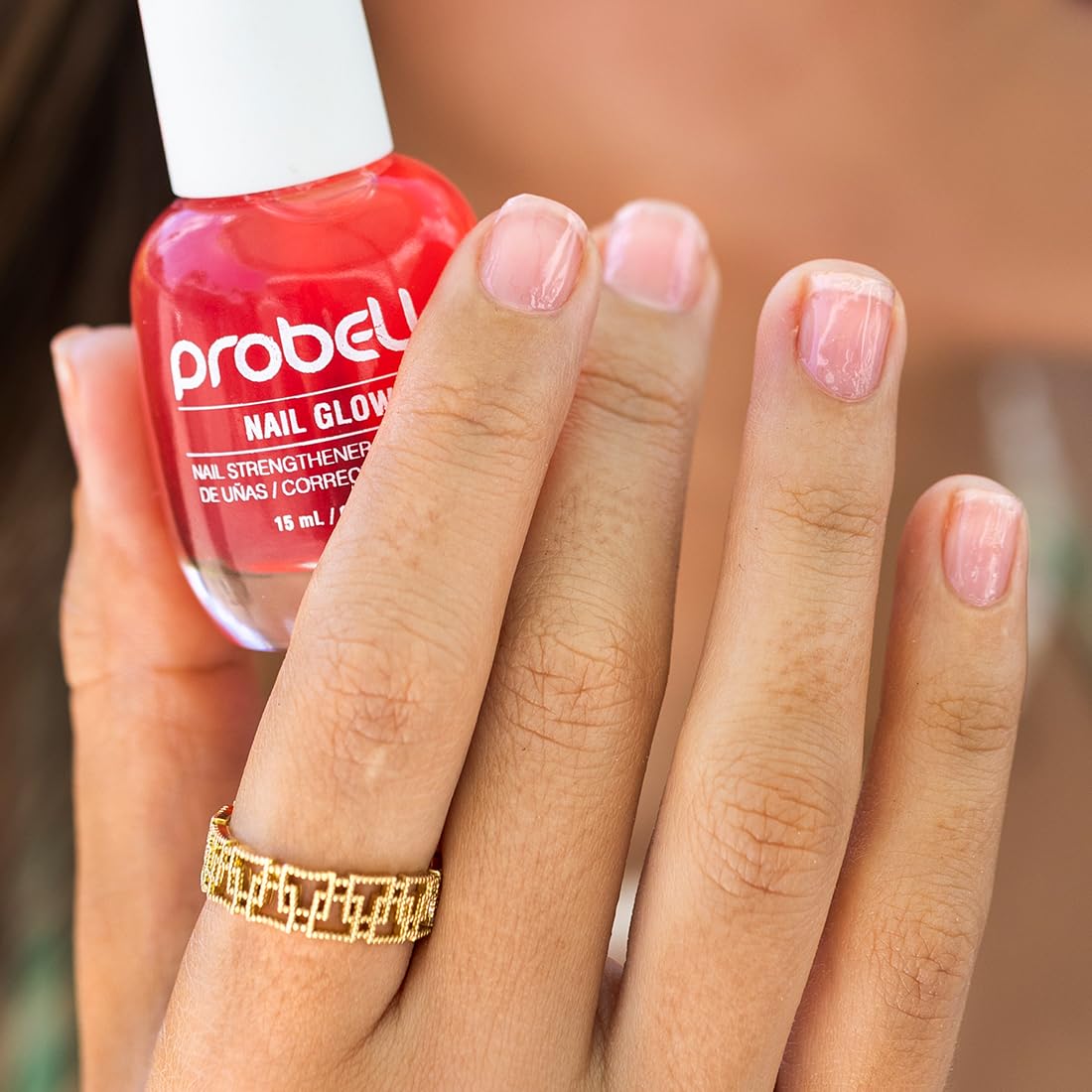 Probelle bottle next to ruler showing 0.5 oz size for travel-friendly benefit