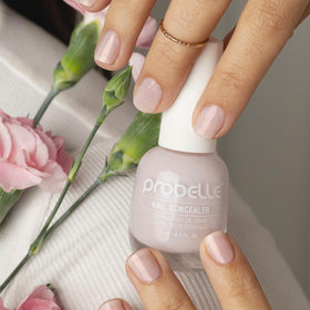 Probelle swatch on nail tips illustrating sheer lilac coverage and concealment
