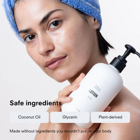 Public Goods bottle held to show 12 fl oz scale and travel-friendly size
