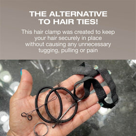 PuffCuff held in hand to show size options and visual scale