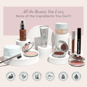 PÜR MINERALS lifestyle shot applying foundation in mirror for natural glow