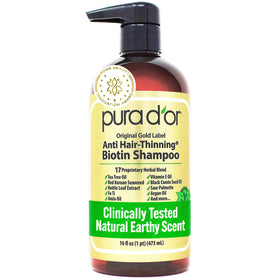 PURA D'OR front bottle showing gold label and clean-beauty benefits