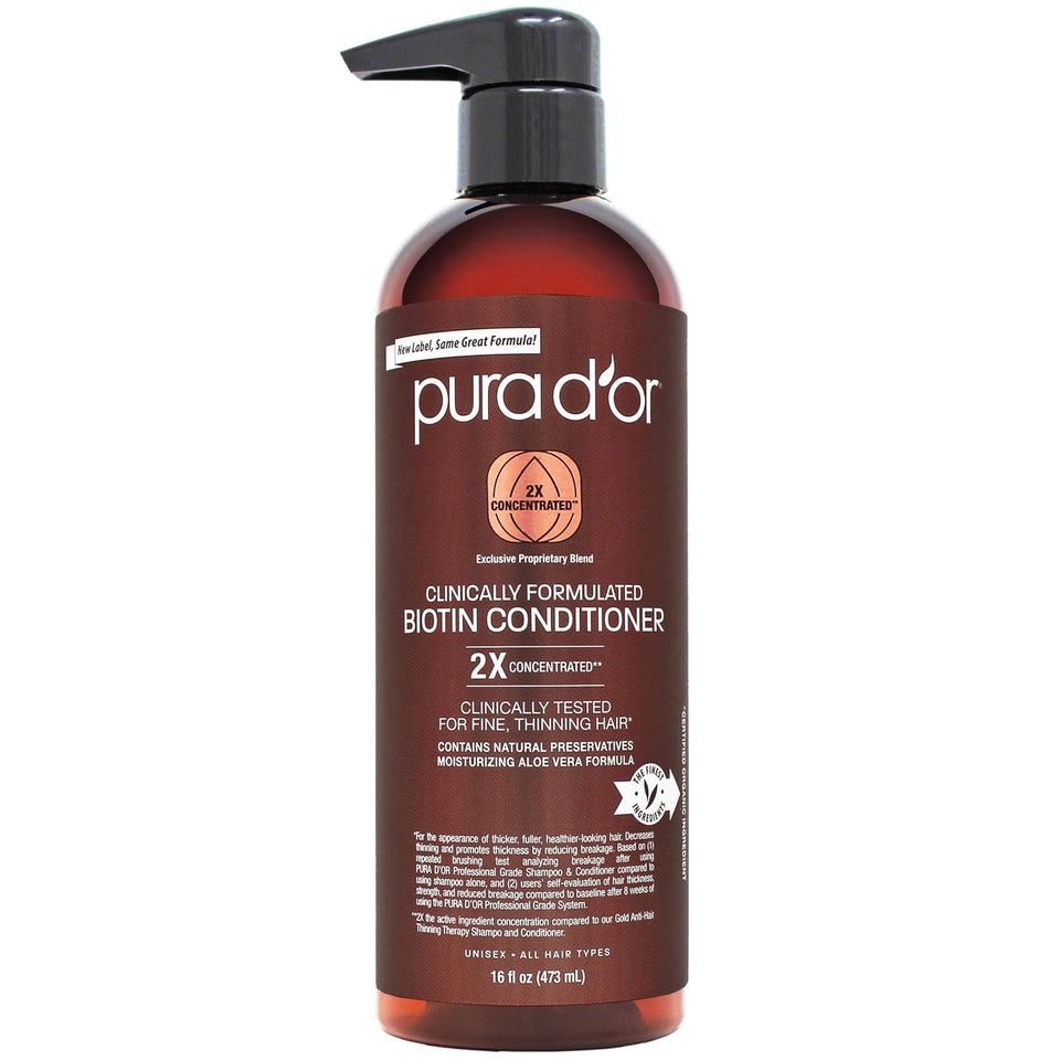 PURA D'OR front bottle showing label and volume benefit