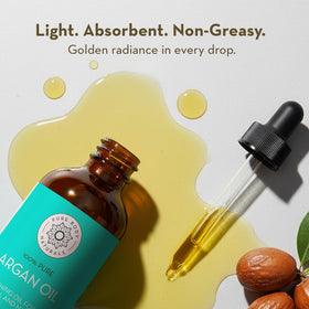Pure Argan Oil applied to hair ends to smooth frizz and add healthy shine