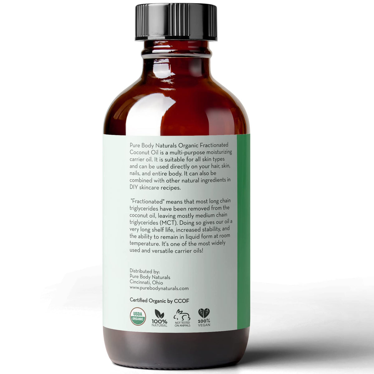 Pure Body Naturals bottle beside measuring cup showing 4 fl oz scale