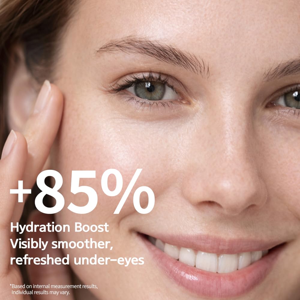 Person applying Purederm under eye with roller to reduce puffiness