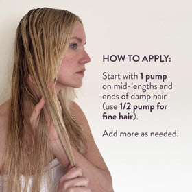 Pureology applied to mid-lengths in hand demonstrating detangling and softness