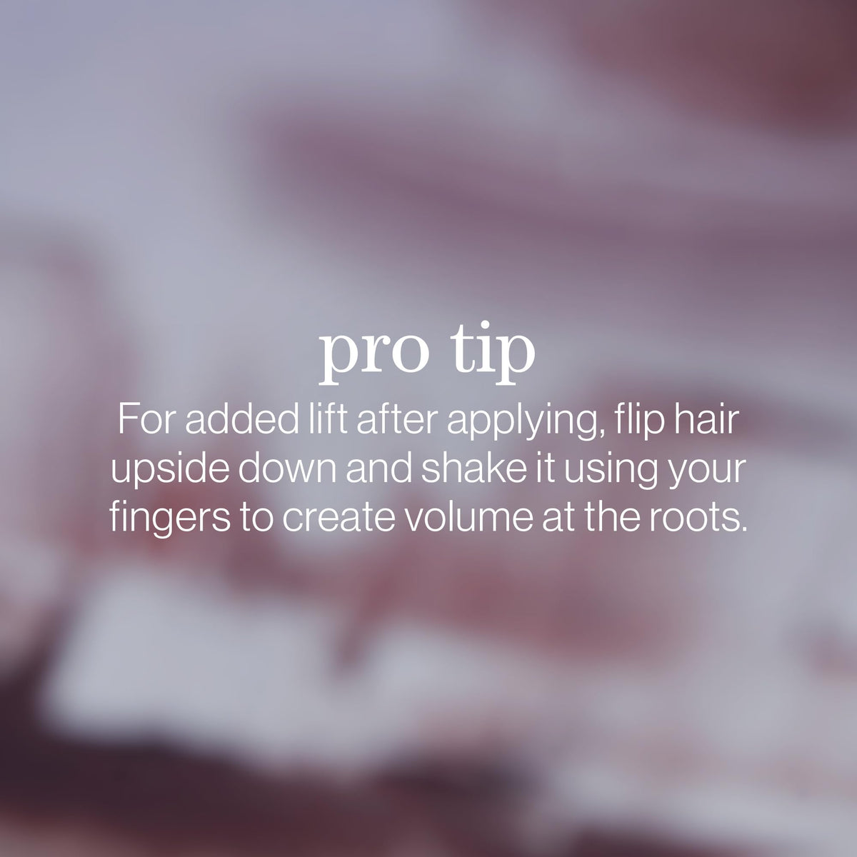 Pureology used outdoors on styled hair highlighting color-safe protection
