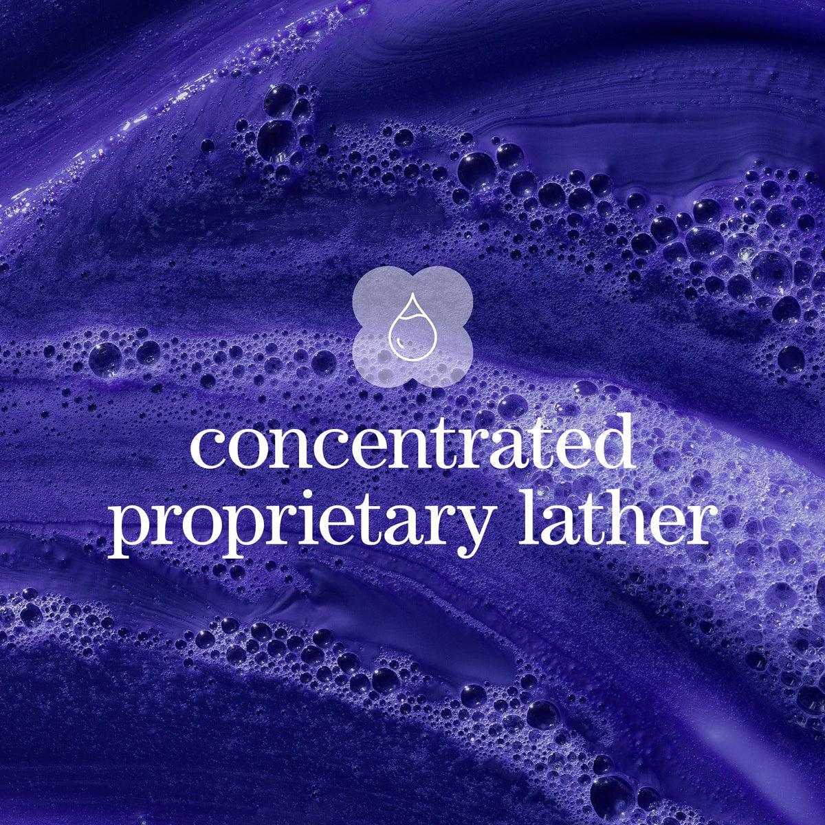 Pureology Strength Cure Blonde being applied in shower to tone brass and cleanse benefit