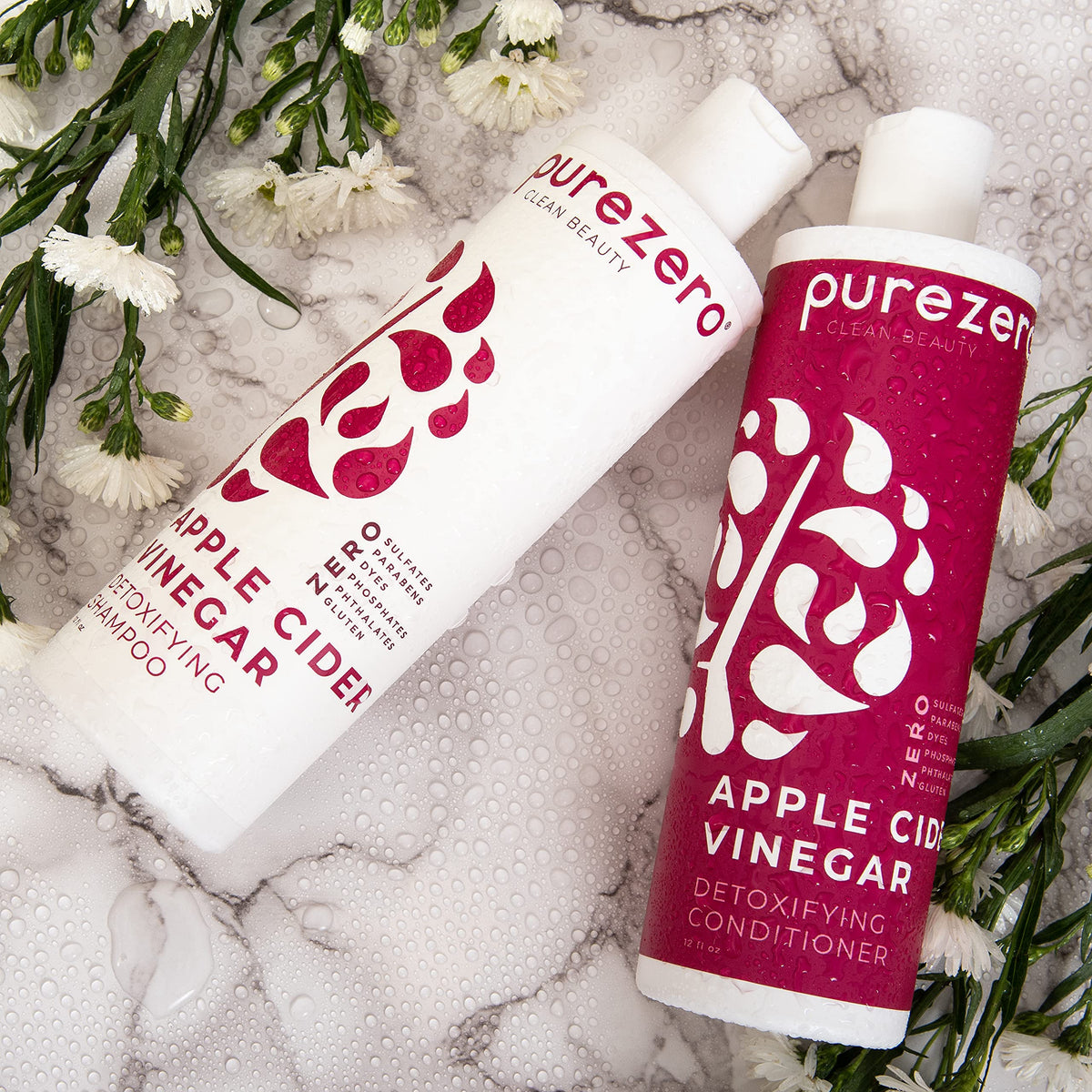 Purezero bottles beside hand for scale showing real size benefit