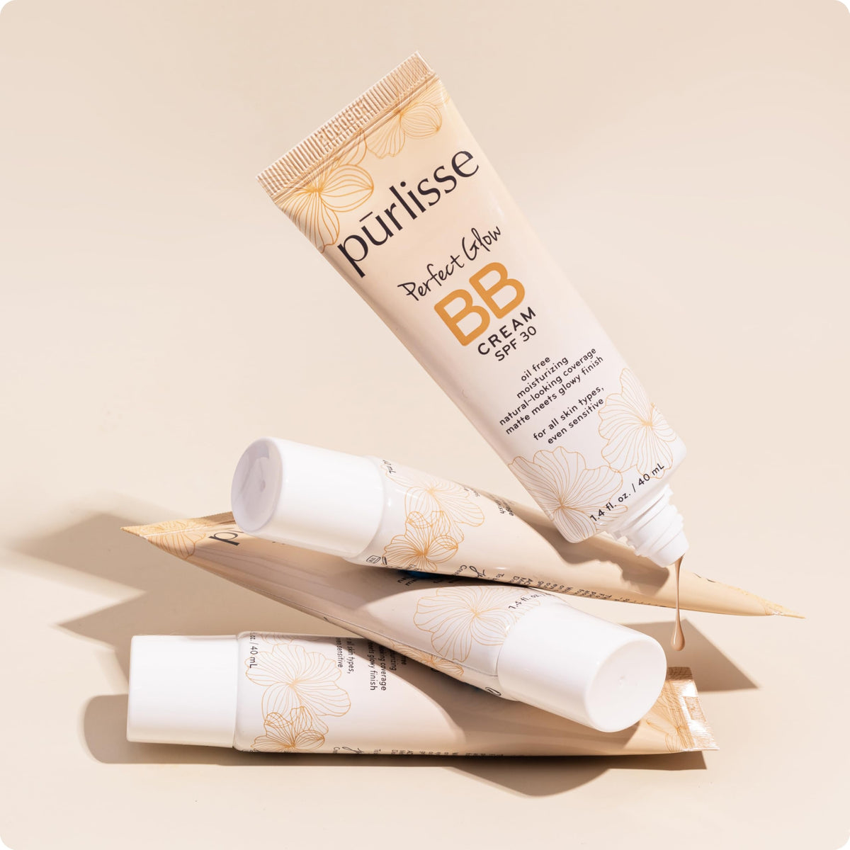 pūrlisse Perfect Glow BB Cream swatch on arm showing Light Medium coverage