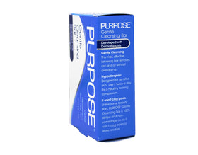 PURPOSE cleansing bar held in hand to show 6 oz scale and travel convenience