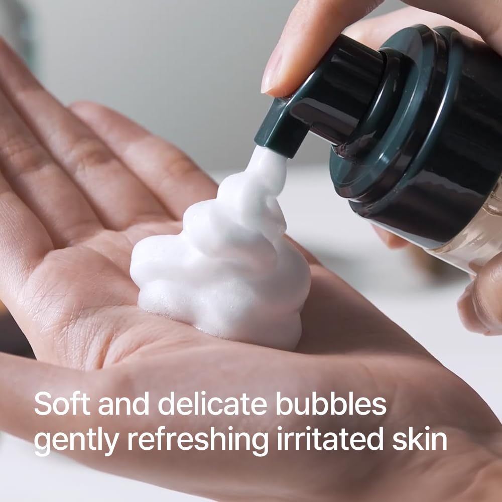 Pyunkang Yul next to a hand for size comparison showing portable 150ml convenience benefit