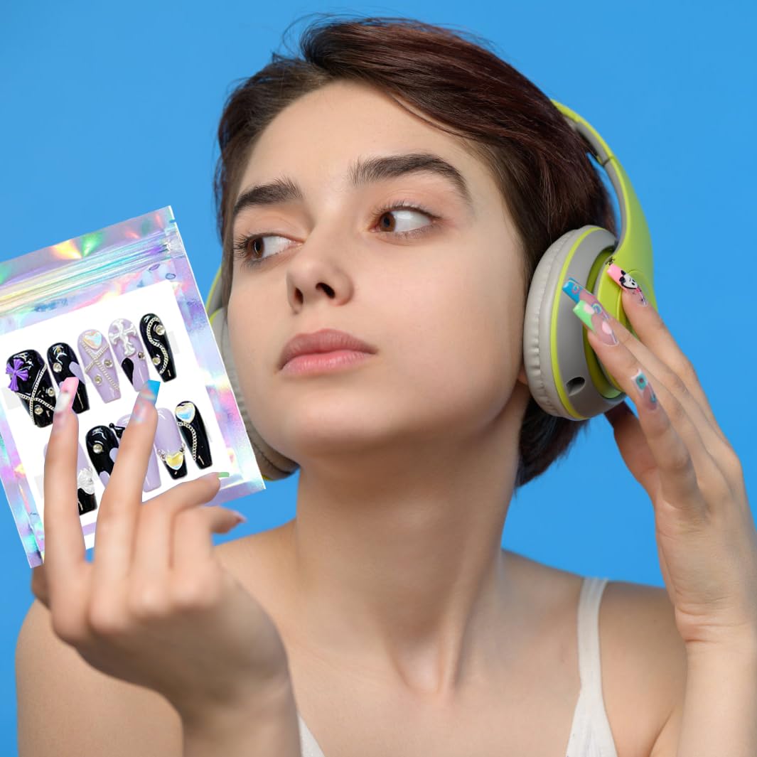 Qenk bags storing false lashes, jewelry, and nail charms to show versatile use
