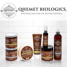 Bathroom shelf lifestyle shot with Qhemet Biologics among hair-care essentials