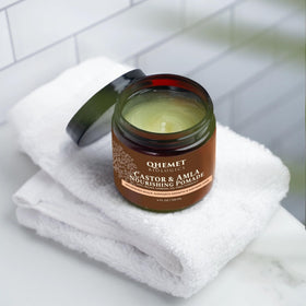 Qhemet Biologics open jar texture close-up showing creamy pomade for easy application
