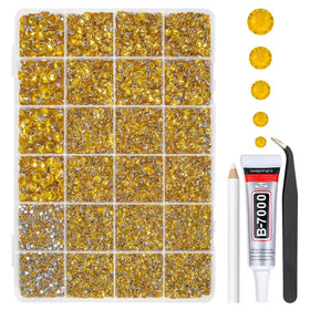 qiipii front box open showing organized golden yellow rhinestones and included glue for easy crafting
