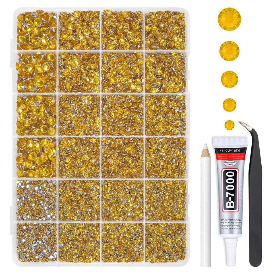 qiipii front box open showing organized golden yellow rhinestones and included glue for easy crafting