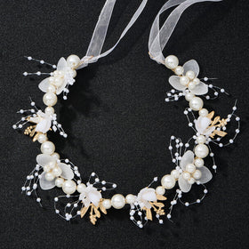 QIUTIMIY close-up of pearls and crystals highlighting handcrafted sparkle