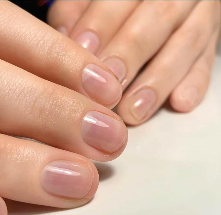 QLS P-Shine finished nails displaying durable natural glossy shine