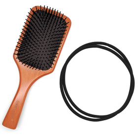 Qooocy hair tie next to ruler showing extra-long size for voluminous styles