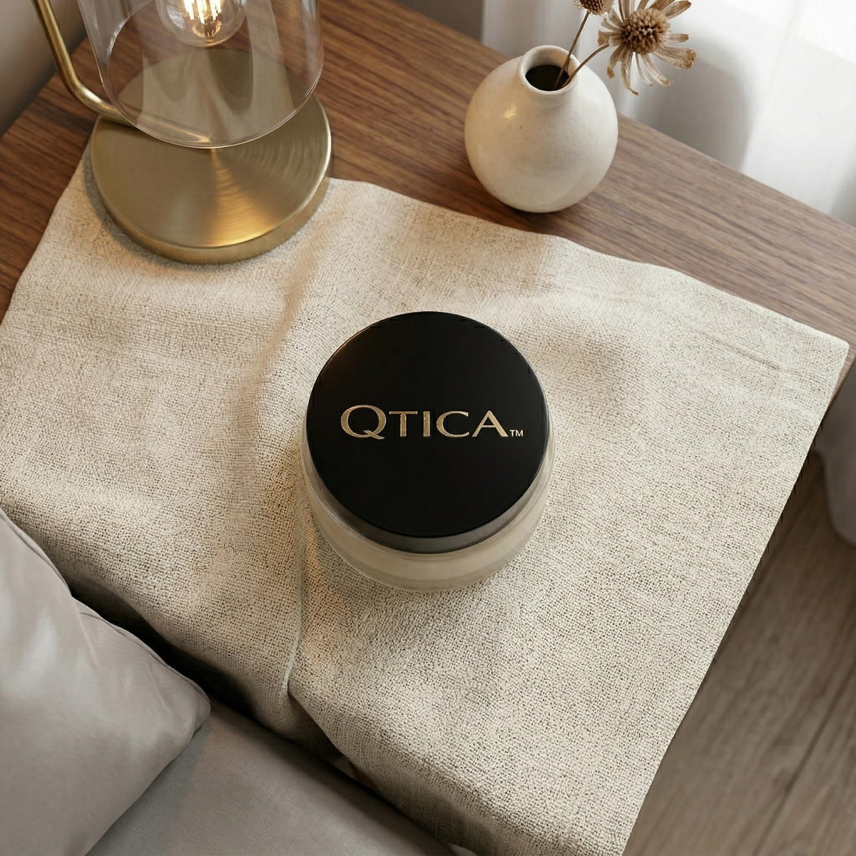 QTICA close-up of thick buttery balm texture illustrating rich hydration