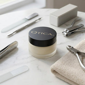QTICA open jar surface highlighting dense formula and clean finish