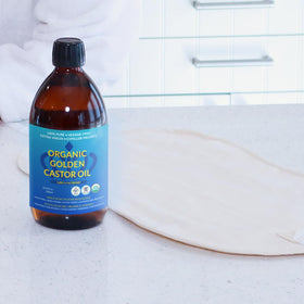 Queen of the Thrones bottle in a spa setting illustrating relaxation and self-care ritual benefit