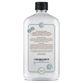 Quinn's 16 oz bottle in hand to show scale and travel-friendly size benefit