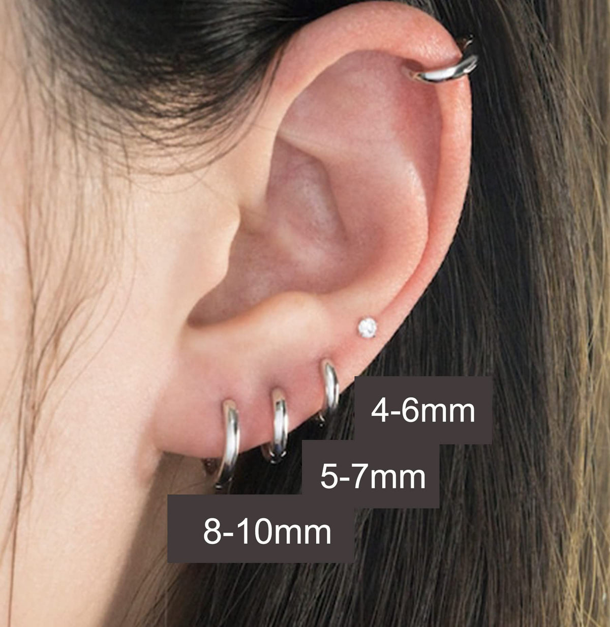 QWALIT kit in a home setting with pad and pen, easy at-home piercing preparation