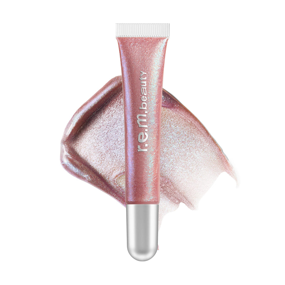 r.e.m. beauty gloss front packaging showing iridescent finish and product name