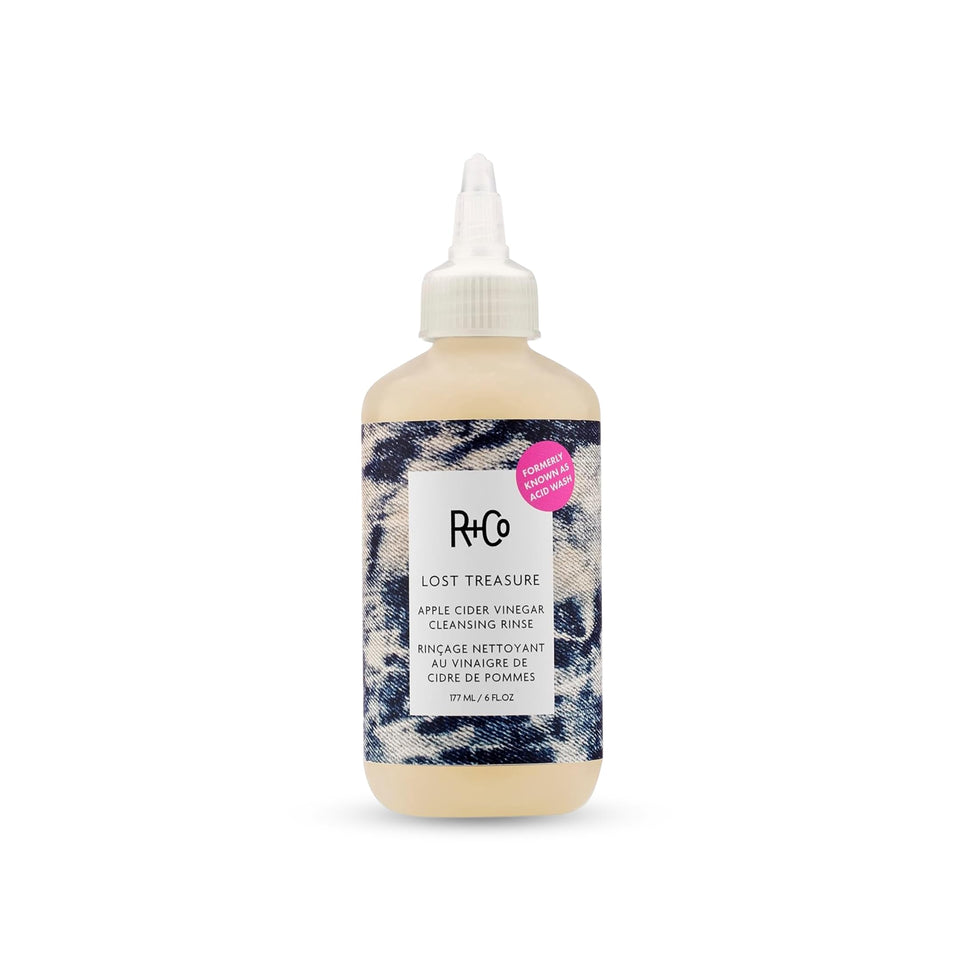 R+Co bottle front view showing product and benefits