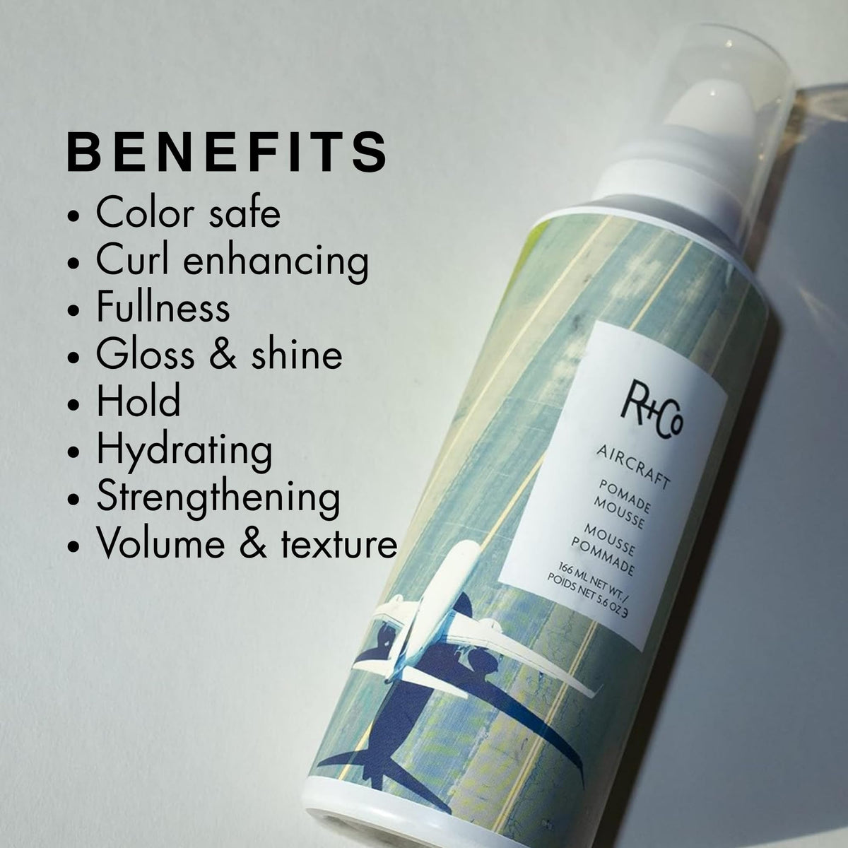R+Co Aircraft beside hand for size comparison and travel-friendly benefit